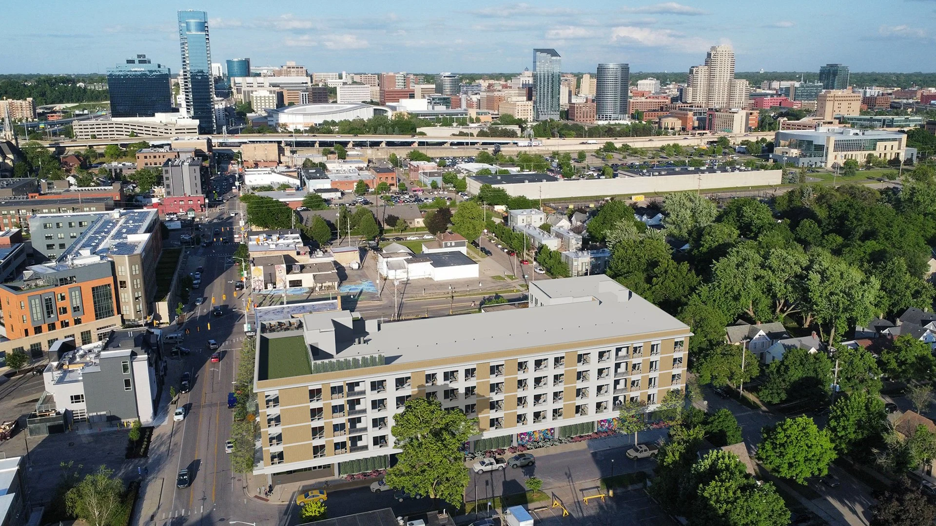 Architectural rendering of Verdant with the Grand Rapids skyline