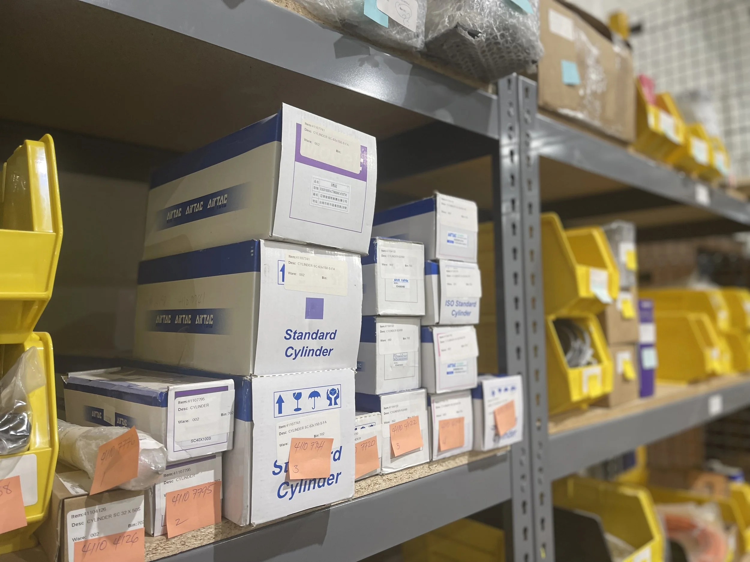 Giben parts warehouse shelving with organized bins