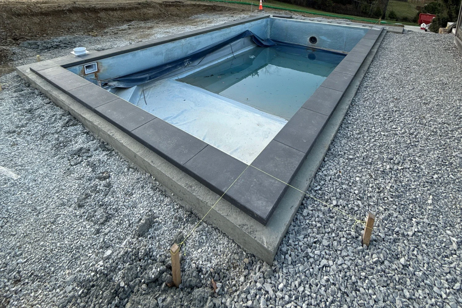 The new deck poured around the pool
