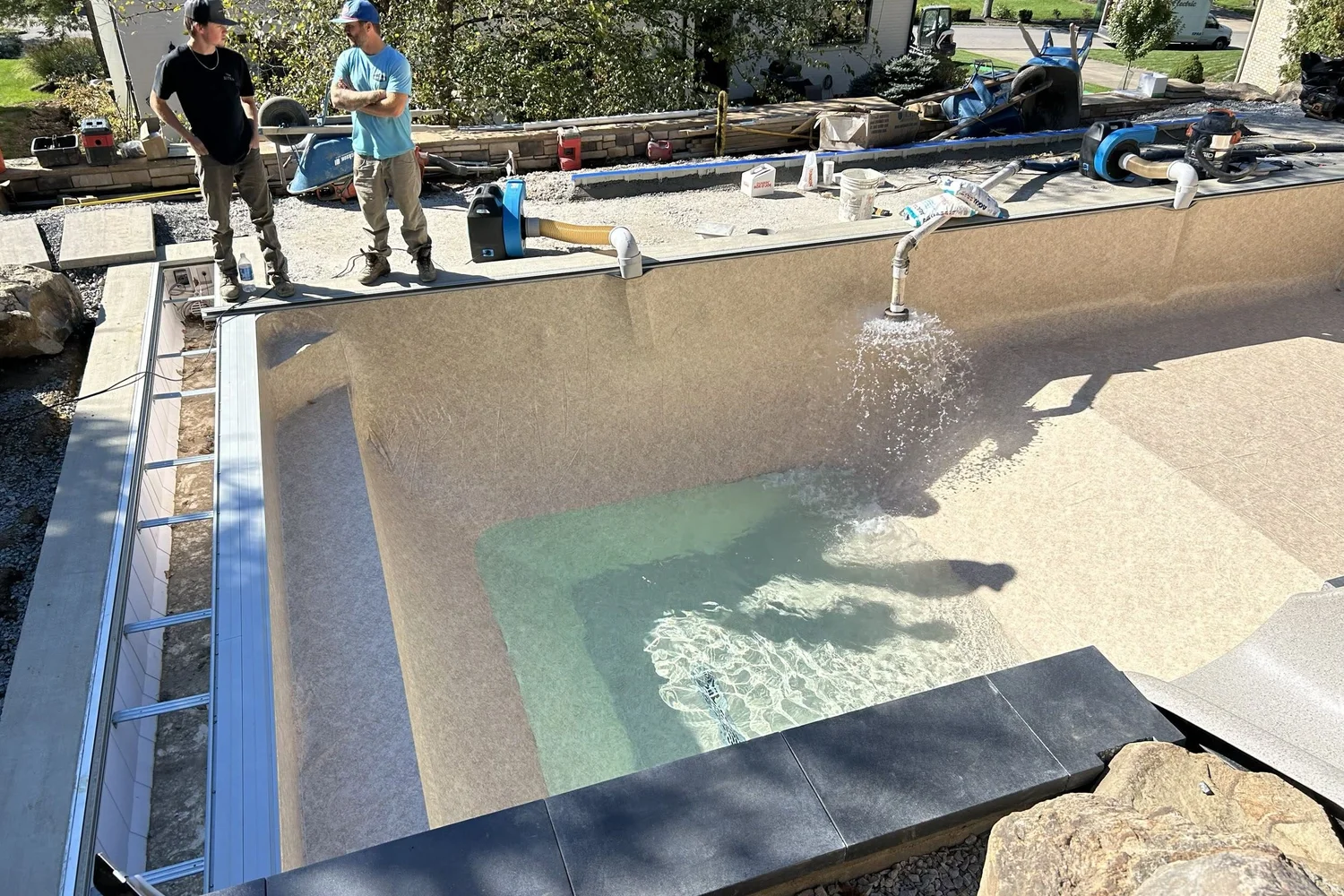 The new liner in and the pool filling