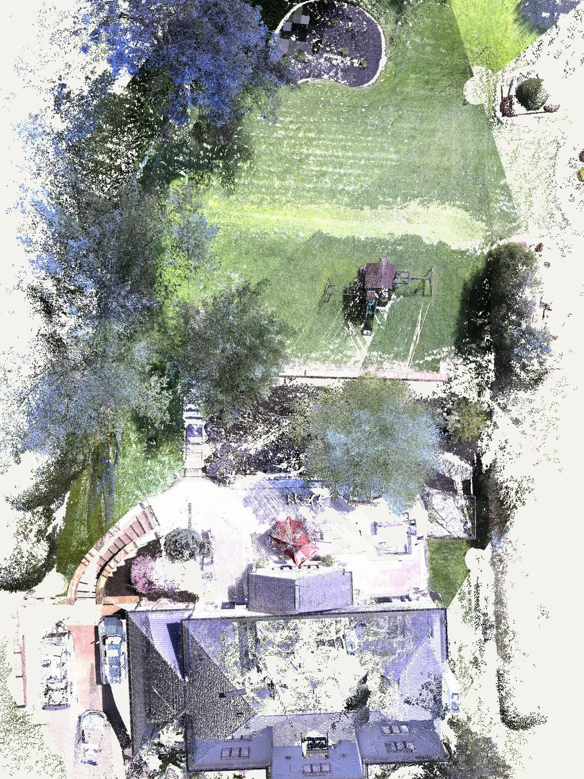 The yard from above as the scan recorded it, with the lawn and swing set where the pool now sits