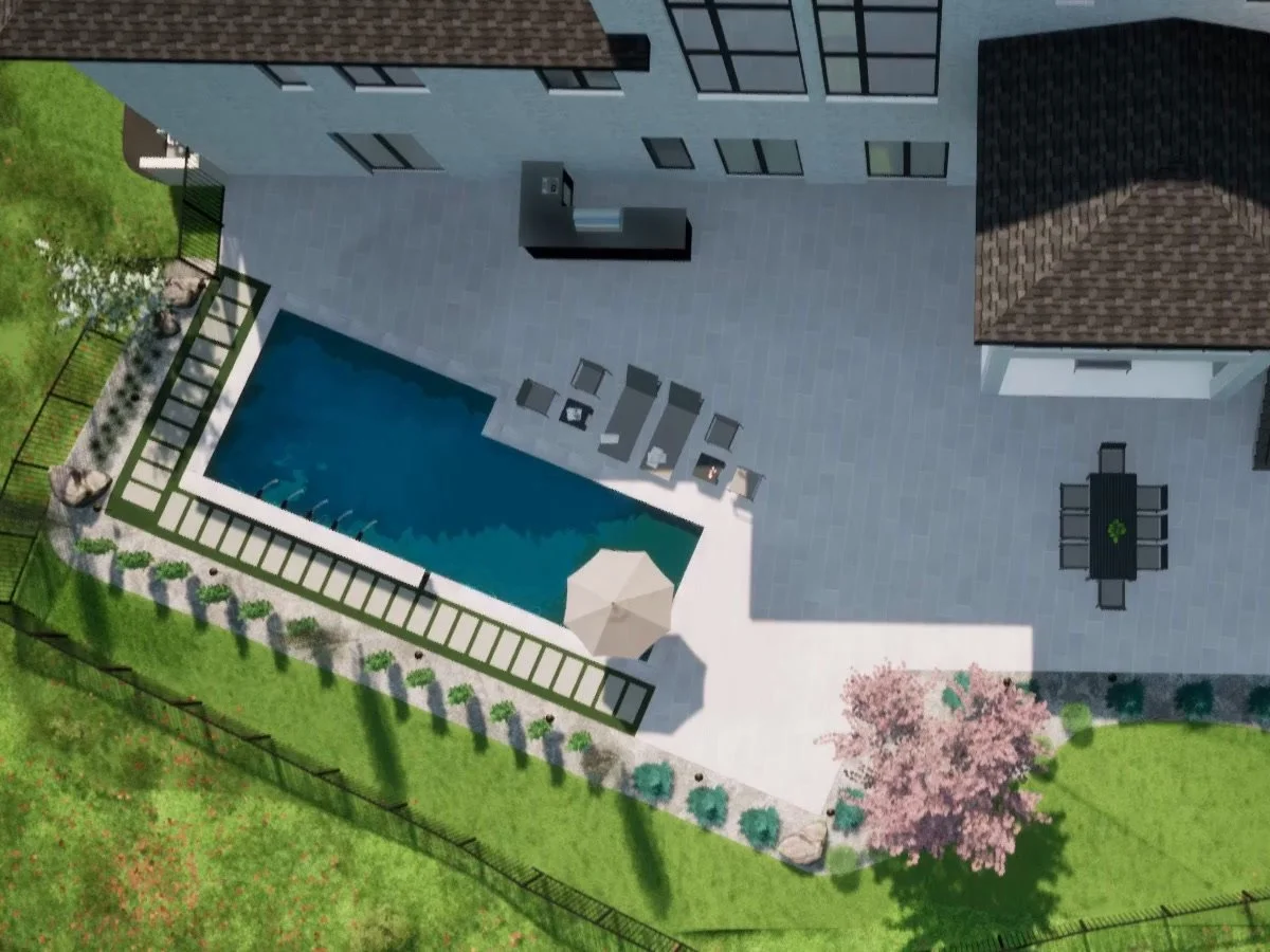 The design from directly above: the pool set at an angle along the fence, the deck and patio, the outdoor kitchen and the planting