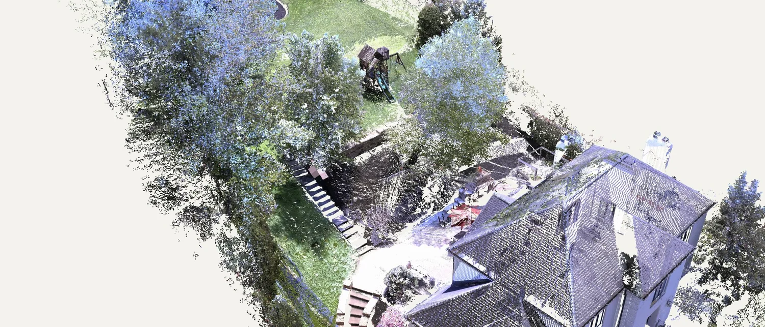 The point cloud of the yard: the house and patio below, the concrete steps up the bank and the lawn above