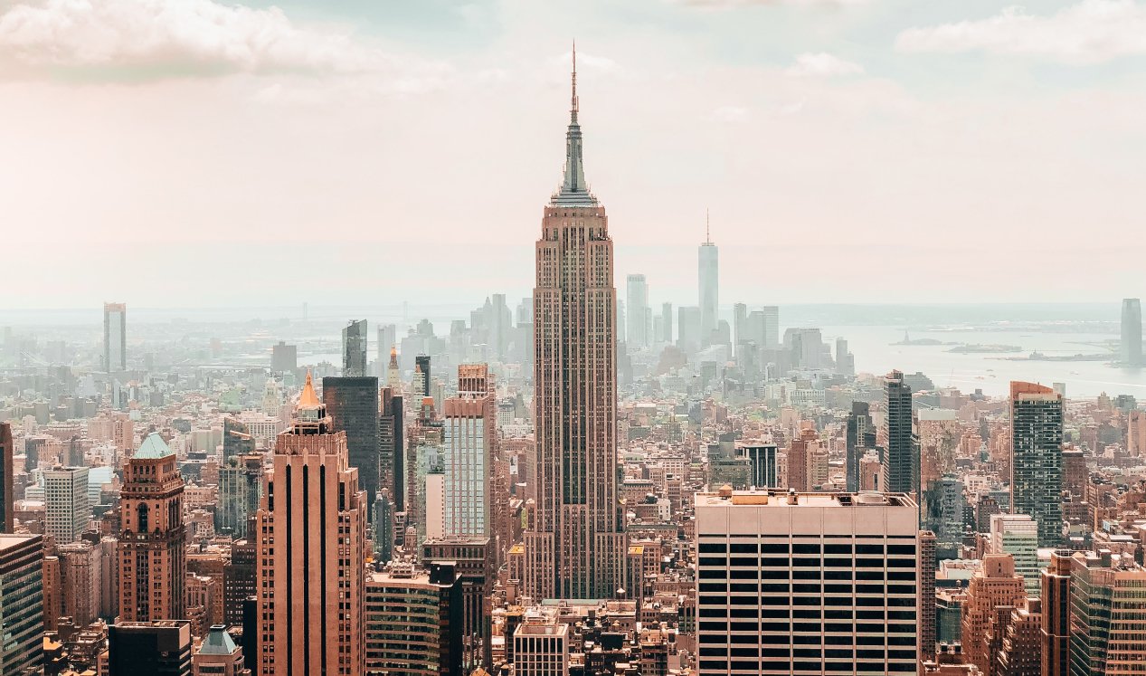 New York City skyline prominently featuring Empire State Building.