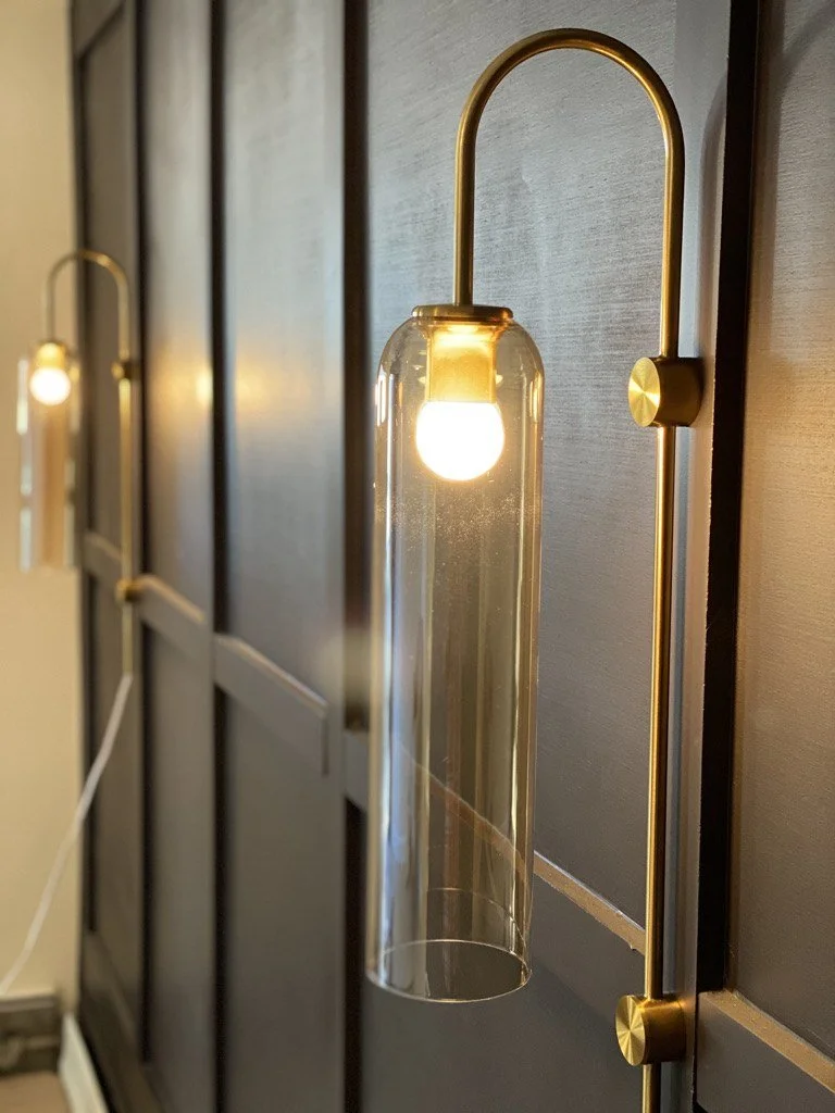 Brass wall sconce