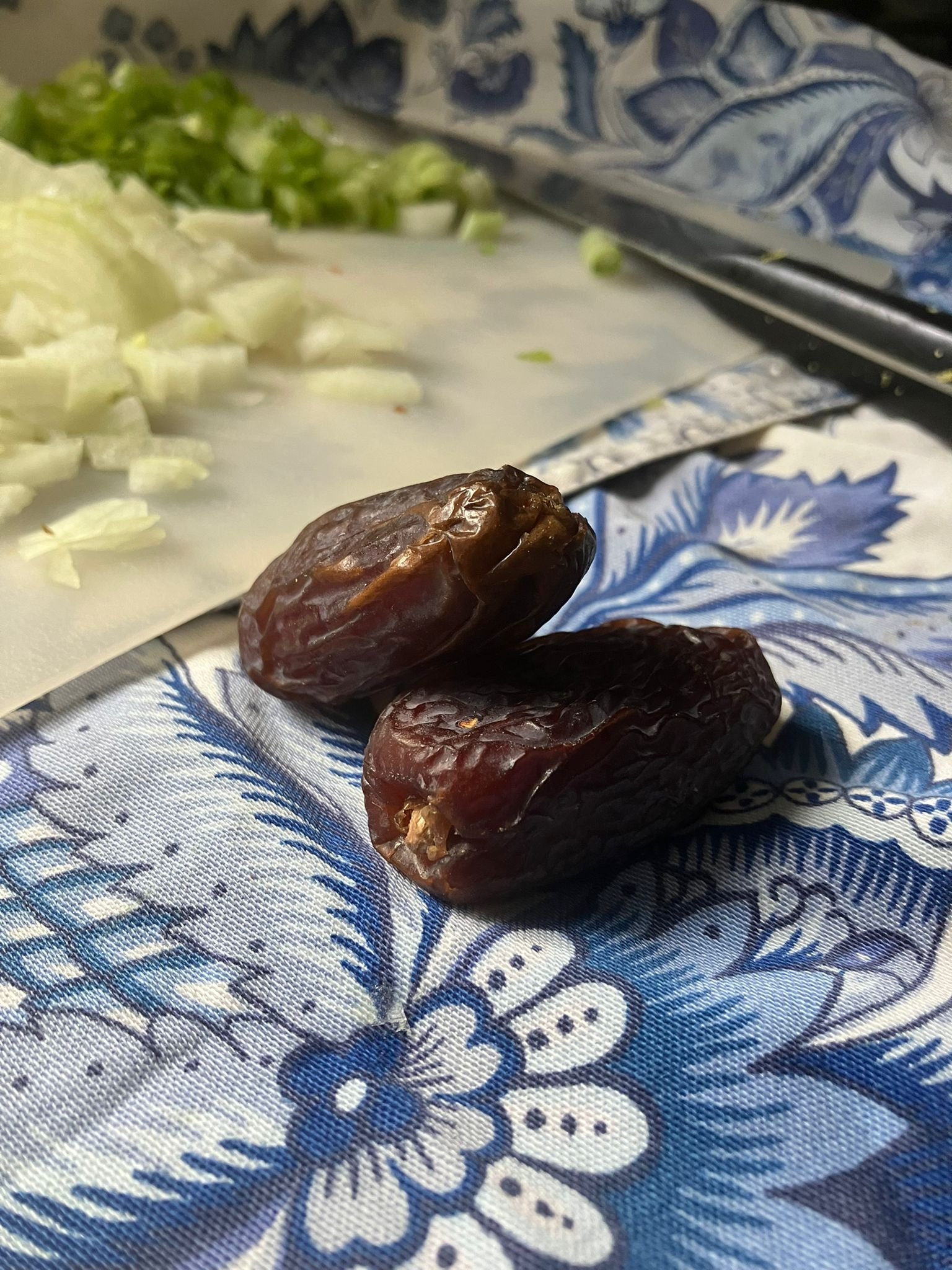 Chopped dates on cutting board