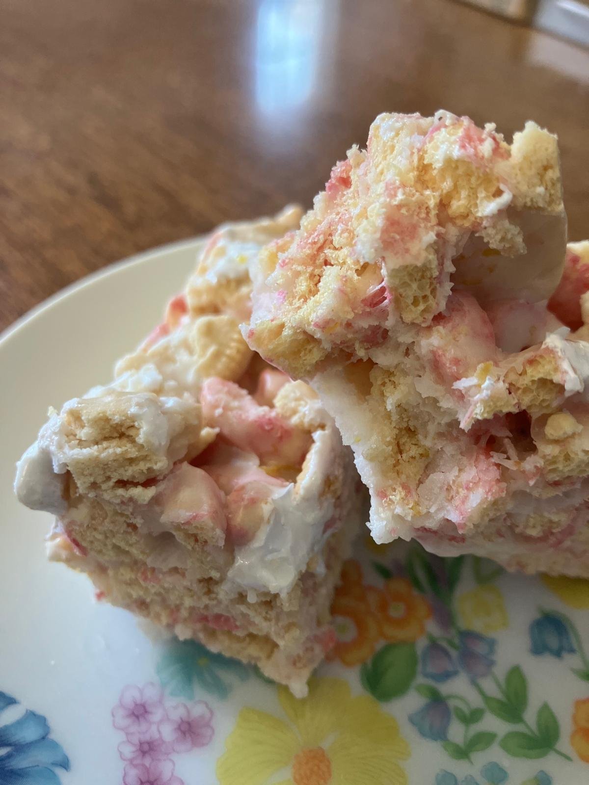 Pink cereal treat with one bite taken out