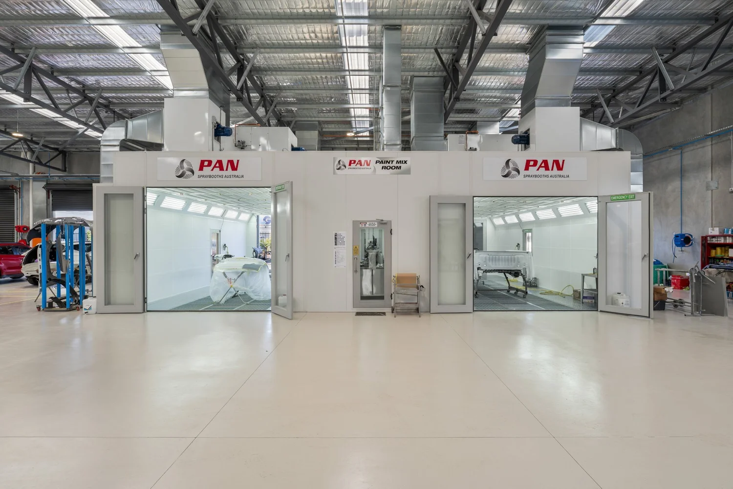 Two Pan spray booths and paint mix room at Vehicle Heroes