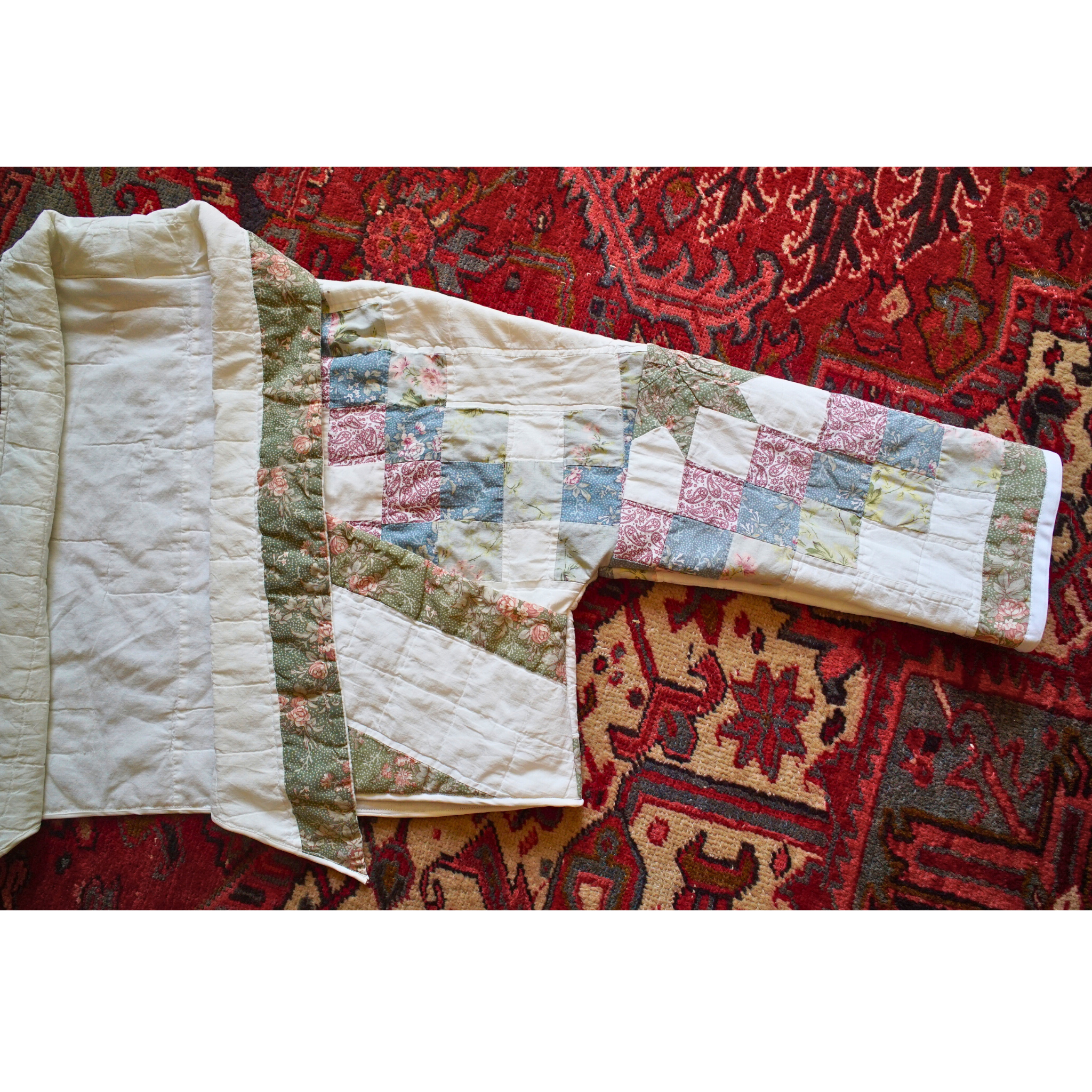 Deep patch pockets on an upcycled patchwork quilt jacket