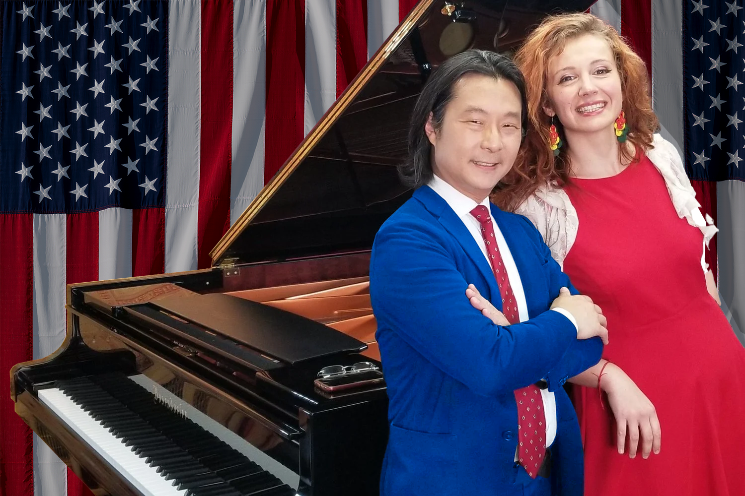 Mada & Hugh Piano Duo at a Bösendorfer grand piano in front of American flags