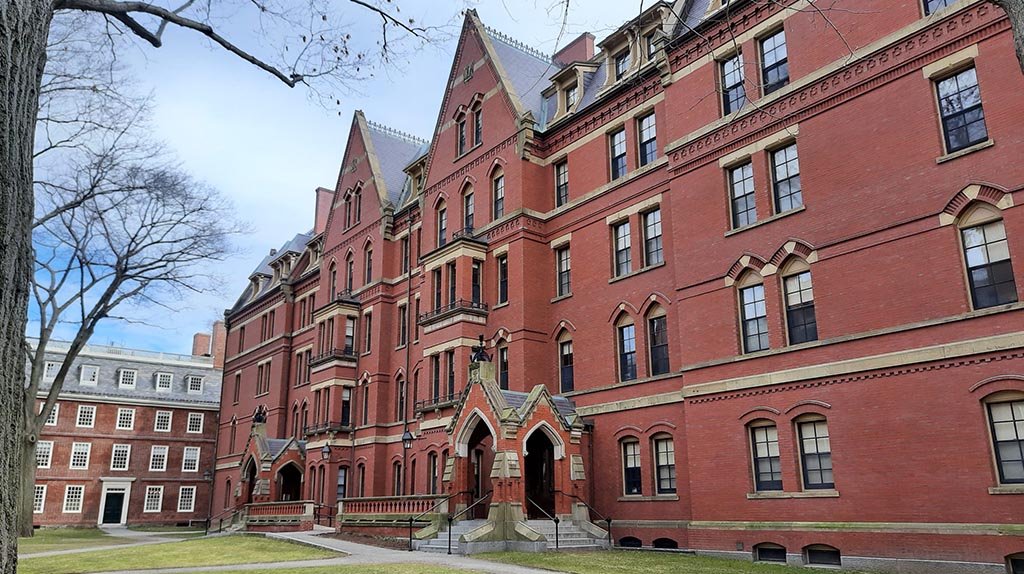 Matthews Hall in Harvard Yard in winter on a partly sunny day