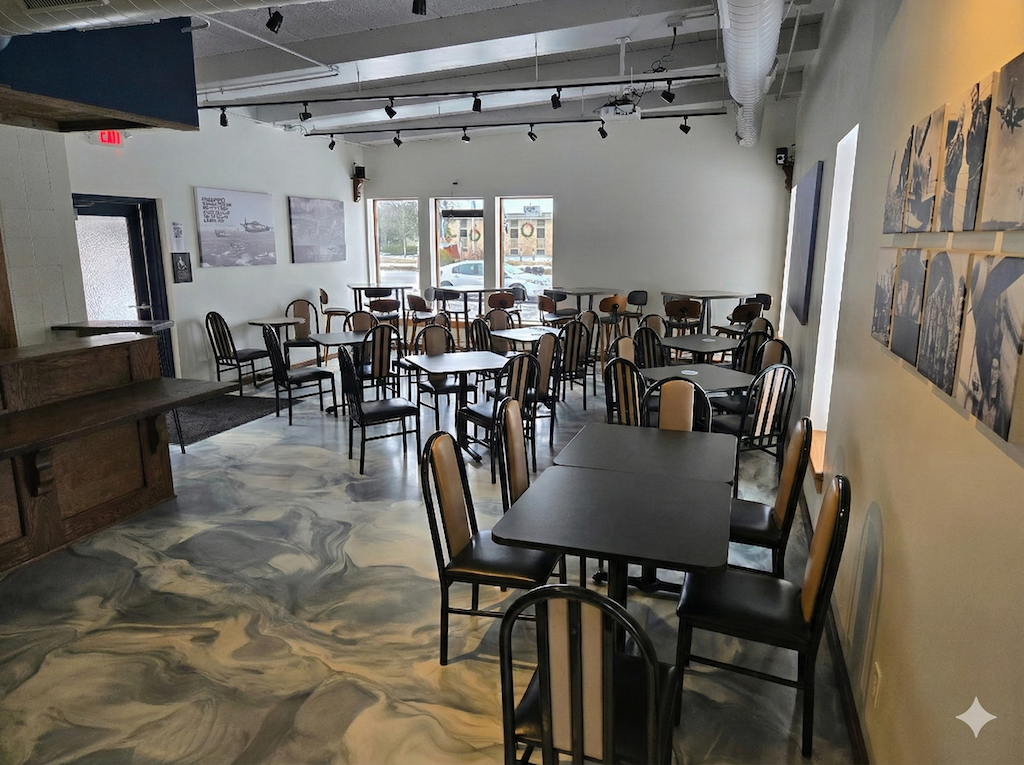 The Ready Room arranged with tables and seating