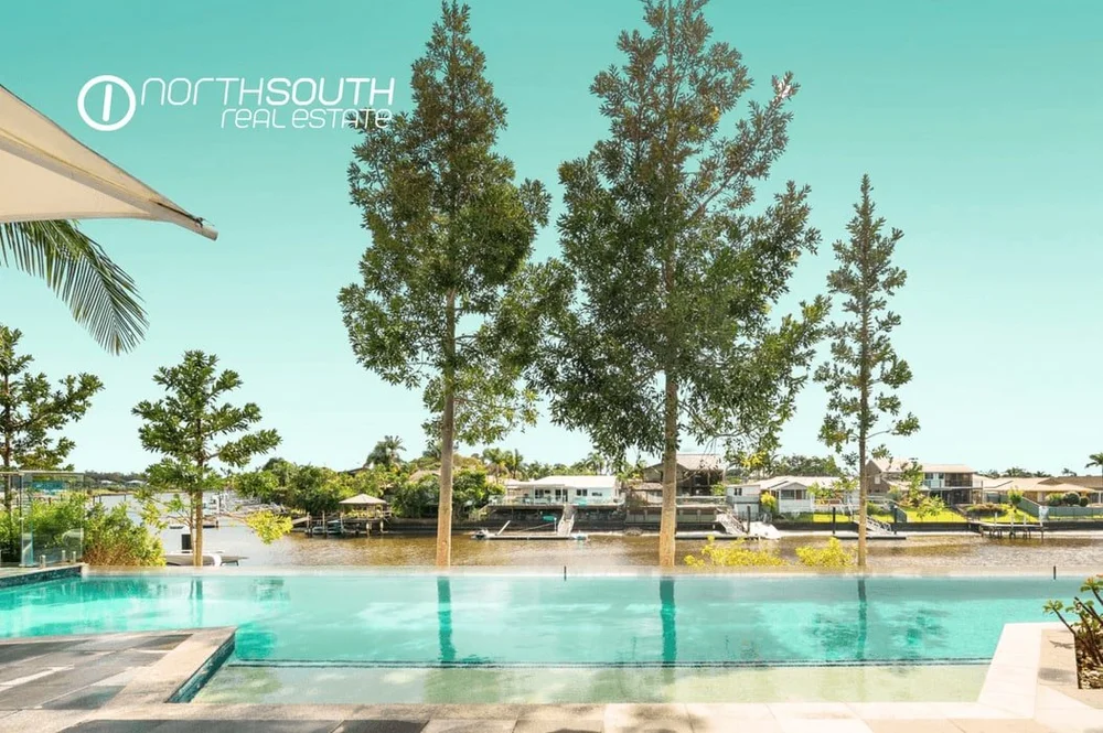 Infinity pool overlooking the water at Waterpoint Residences