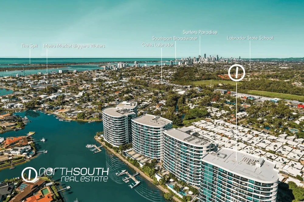 Aerial view of Waterpoint Residences on the canal with the Broadwater and Surfers Paradise skyline behind