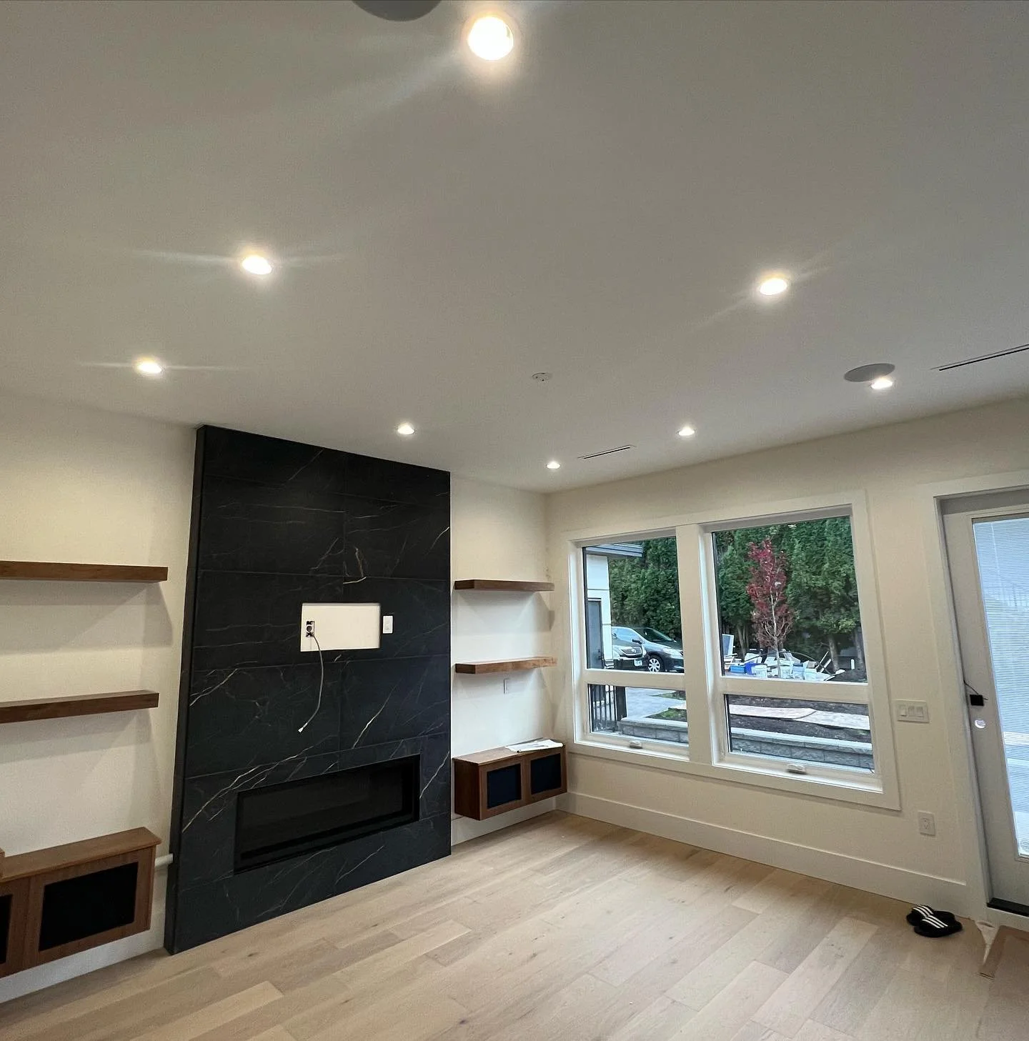 Finished living room media wall electrical work by Hundel Electric