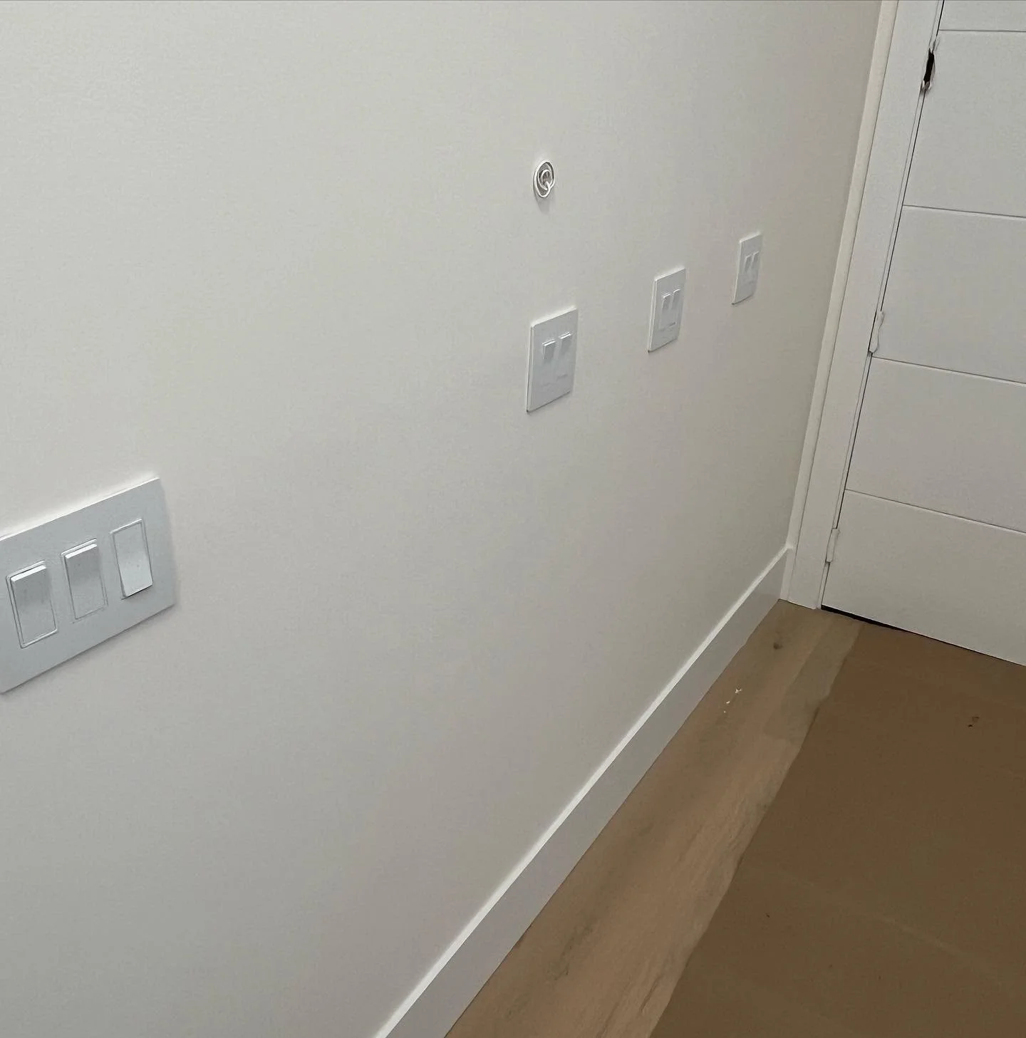 Finished wall switches and receptacles installed by Hundel Electric