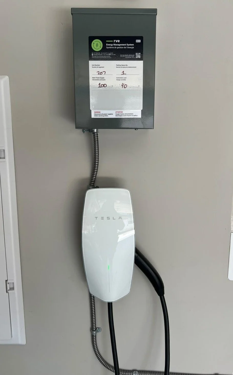 Tesla EV charger and energy management system installed by Hundel Electric