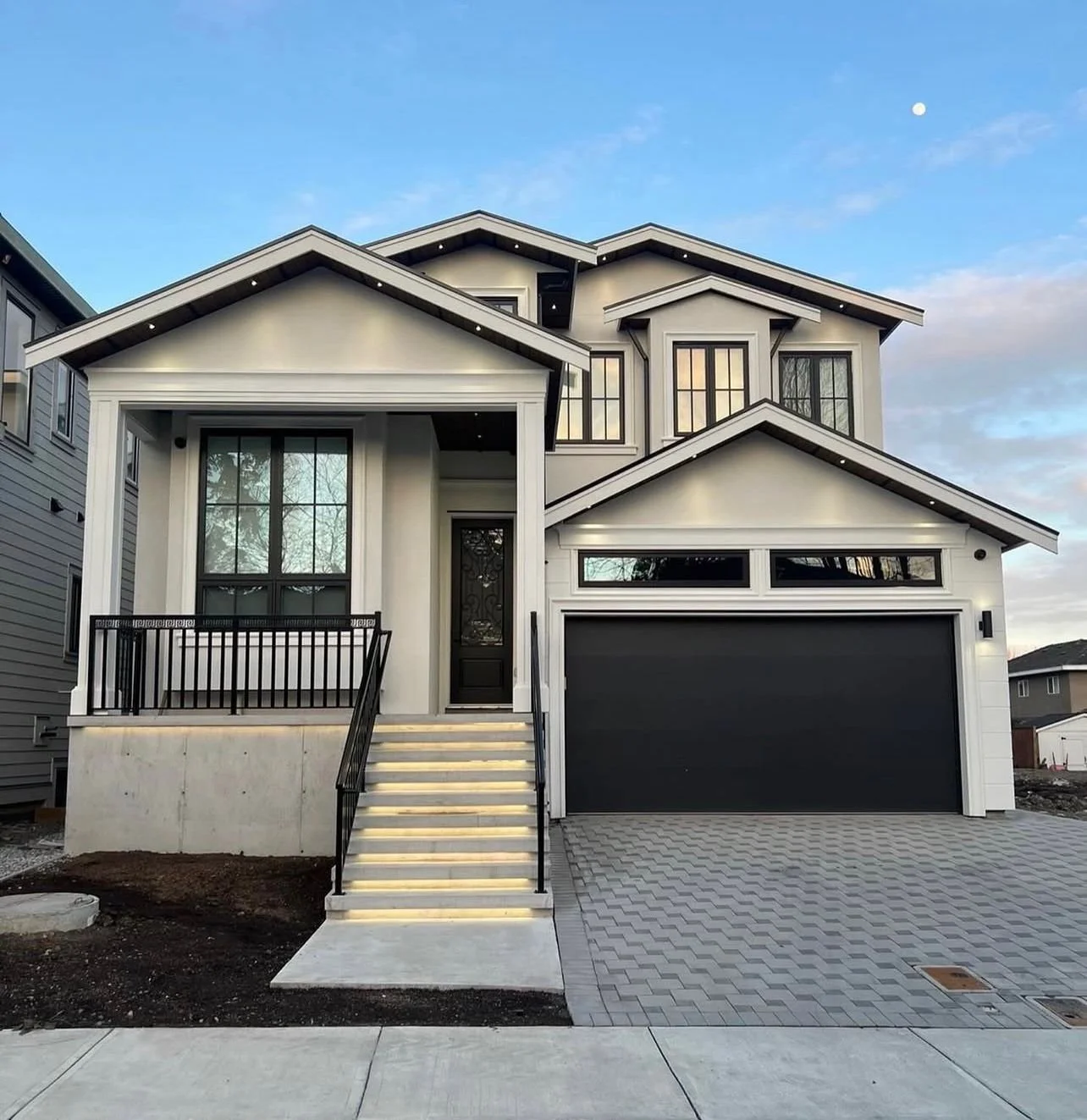 Surrey Fraser Heights custom home exterior with finished electrical lighting