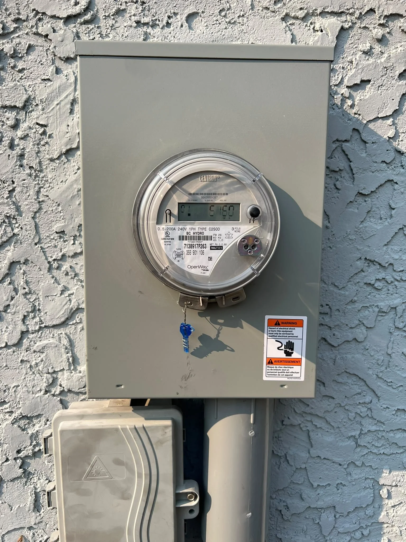 New residential electrical meter base installed for 200 amp underground service