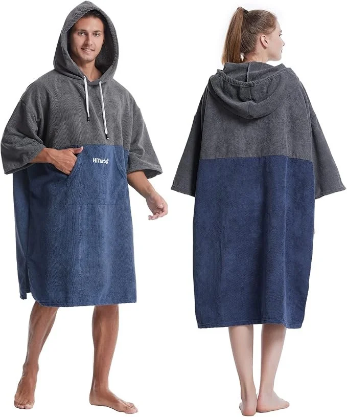 Man and woman model a towel hoodie perfect for changing after scuba diving