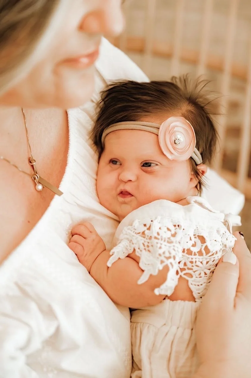 Parent holding their baby