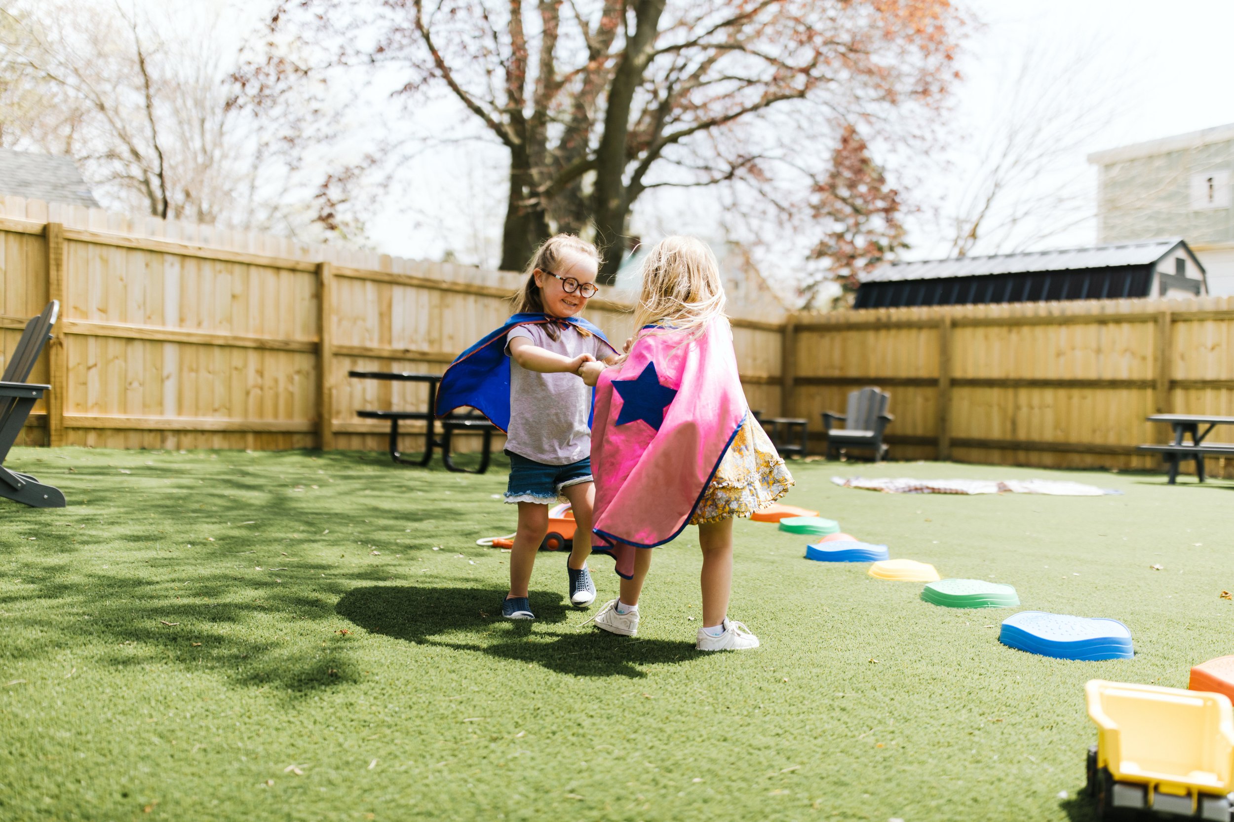 Children playing together at Rising Kites