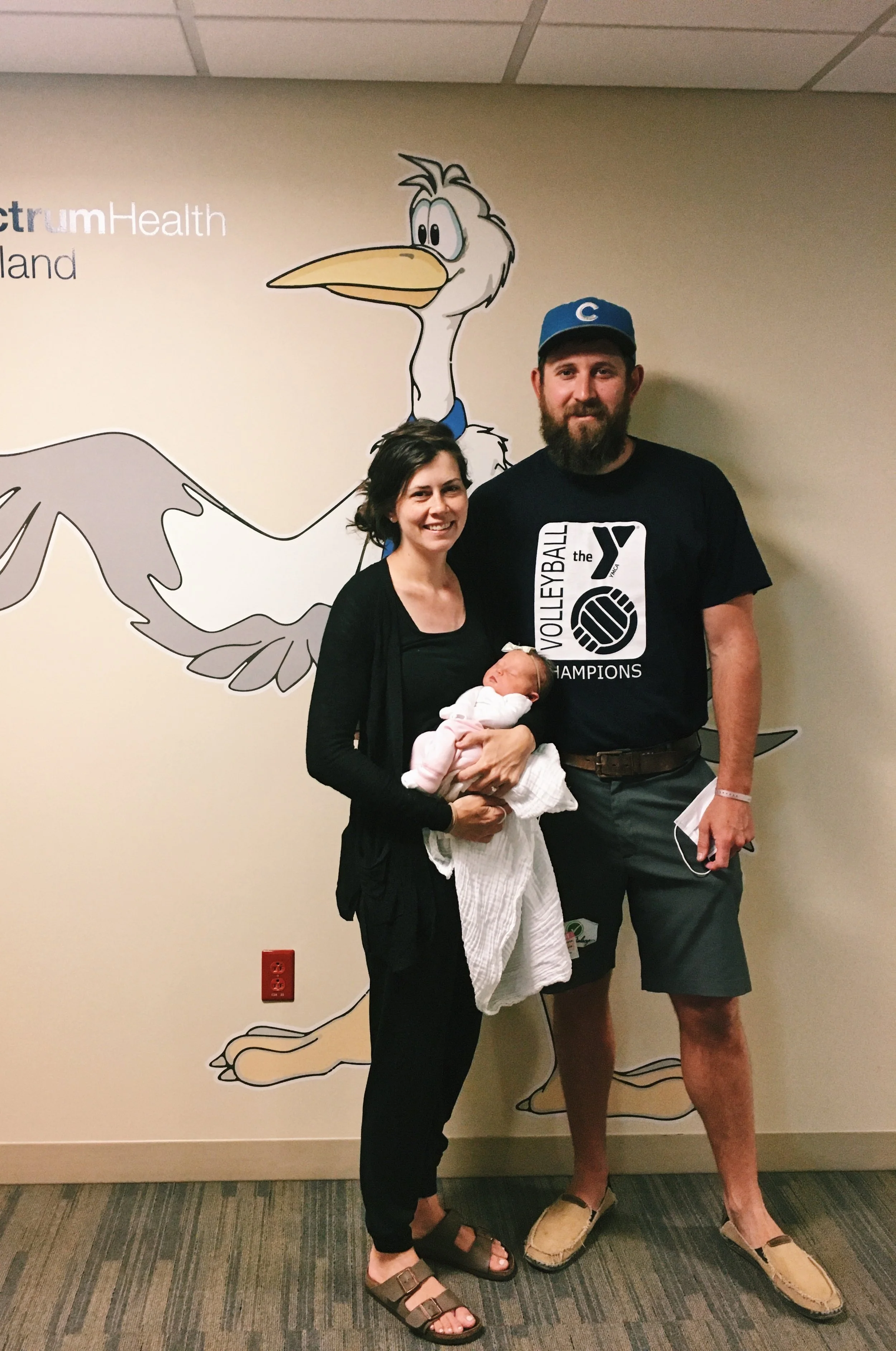 Matt and Danielle holding Sammie before leaving the hospital