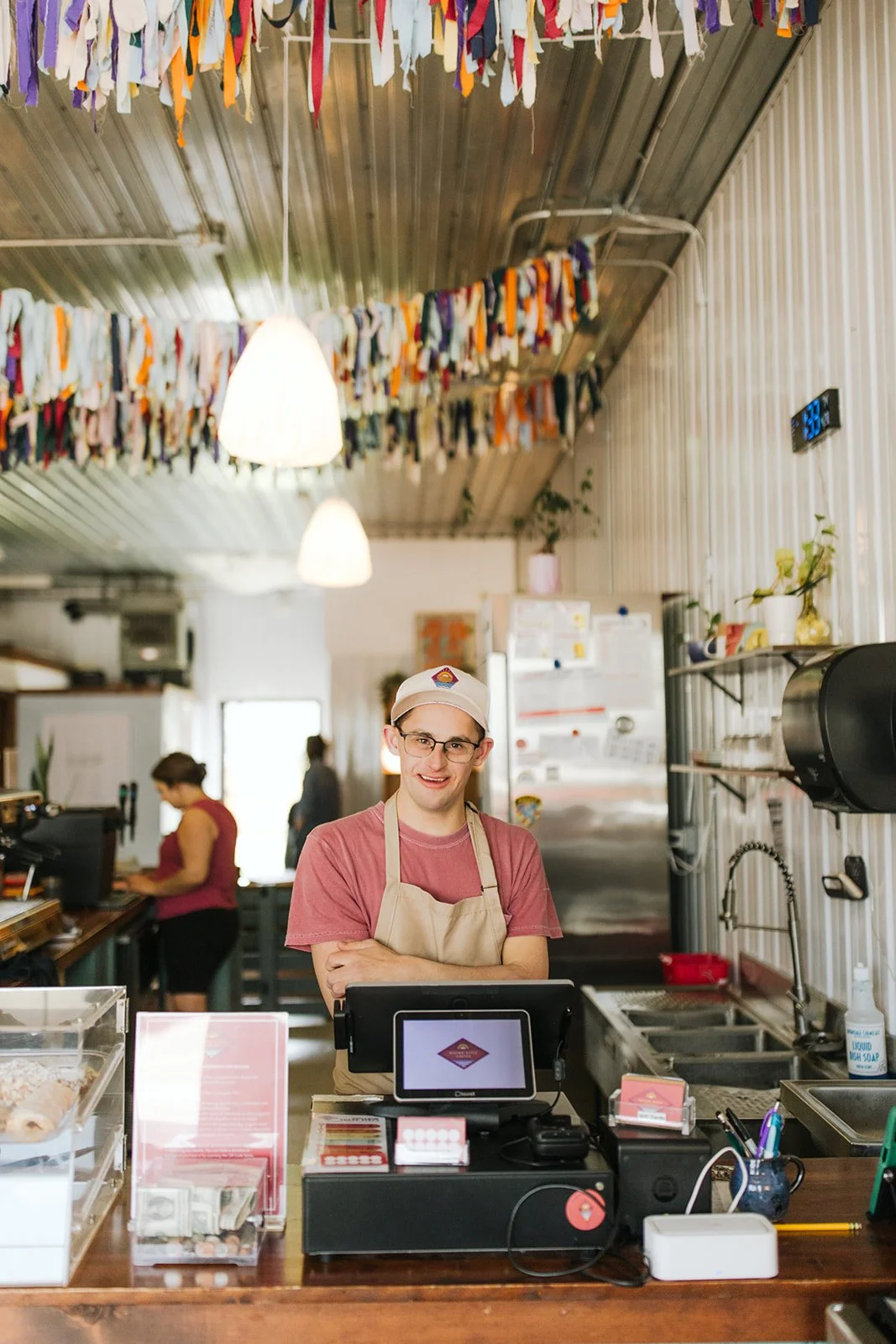 Rising Kites employee working at Rising Kites Coffee