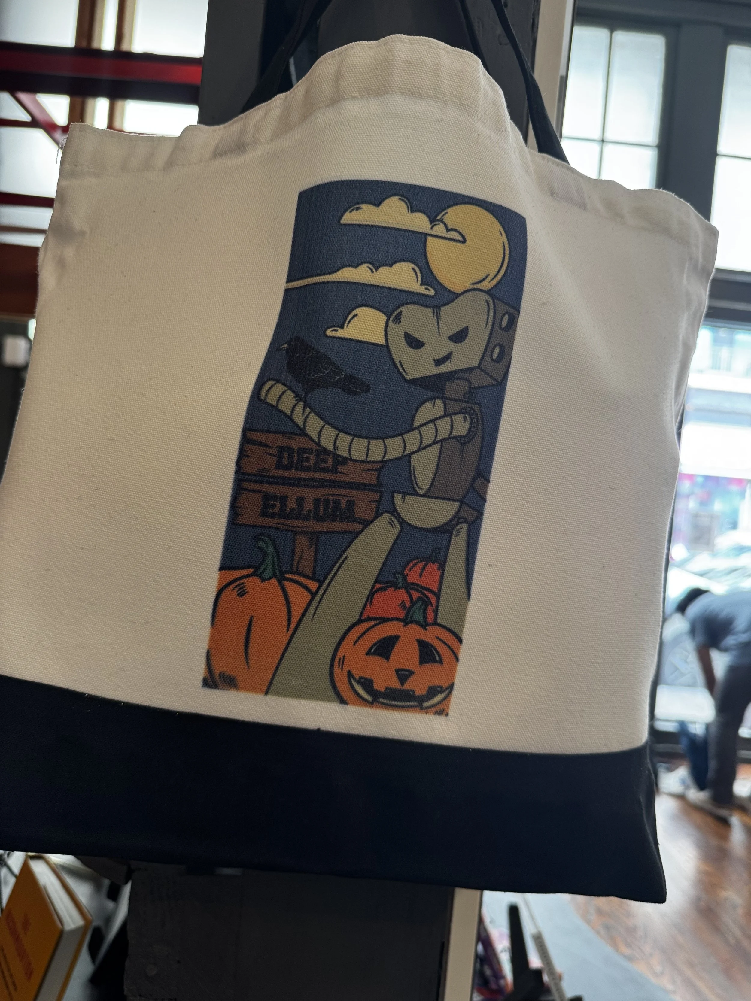 Halloween tote featuring Taylor Peterson’s Deep Ellum banner artwork.
