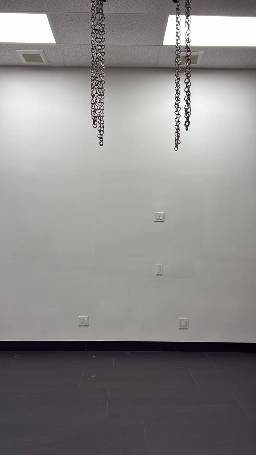 Blank interior wall before the Sri Maha Mariamman Temple mural in Davie, Florida
