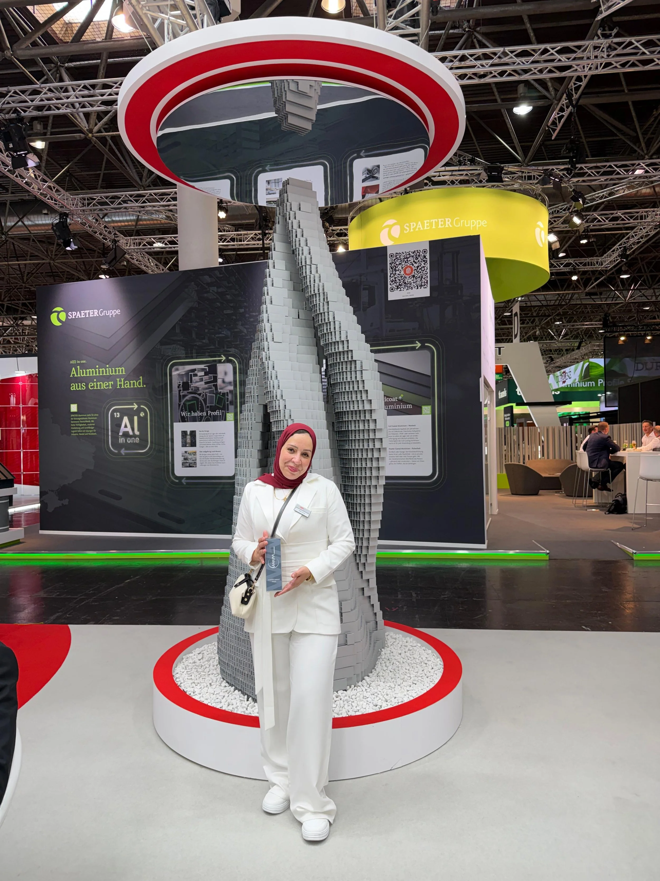 Eng. Rasha Othman receiving the Women with Metal Champion Company Award