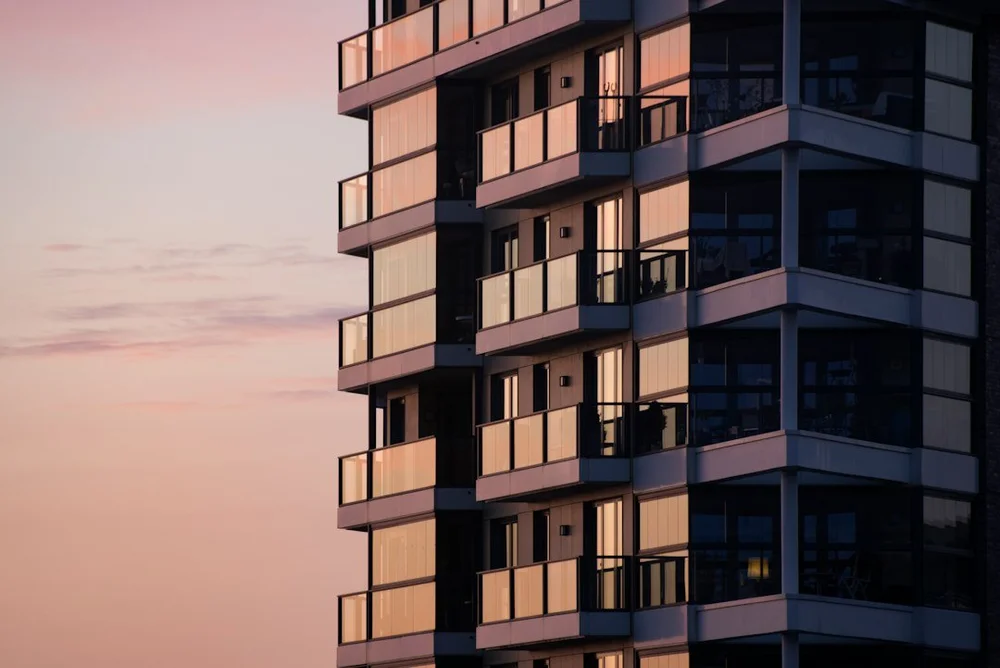 Apartment building exterior at sunset
