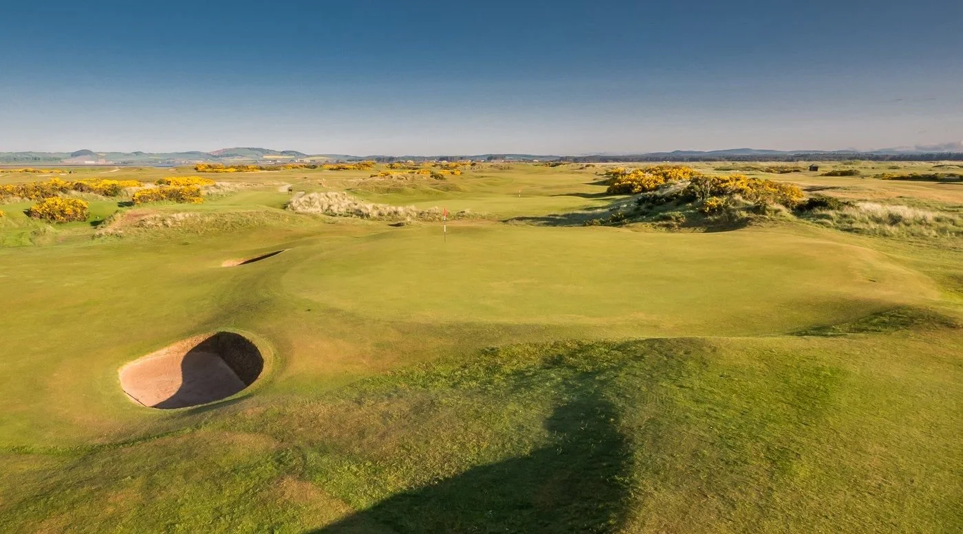 New Course — aerial view, deep pot bunker