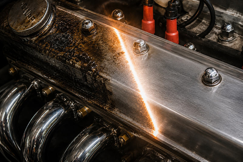 Laser grease and oil removal