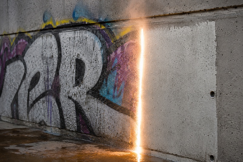 Laser graffiti removal