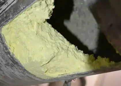 Inside a conventional dry duct caked with sulphur dust