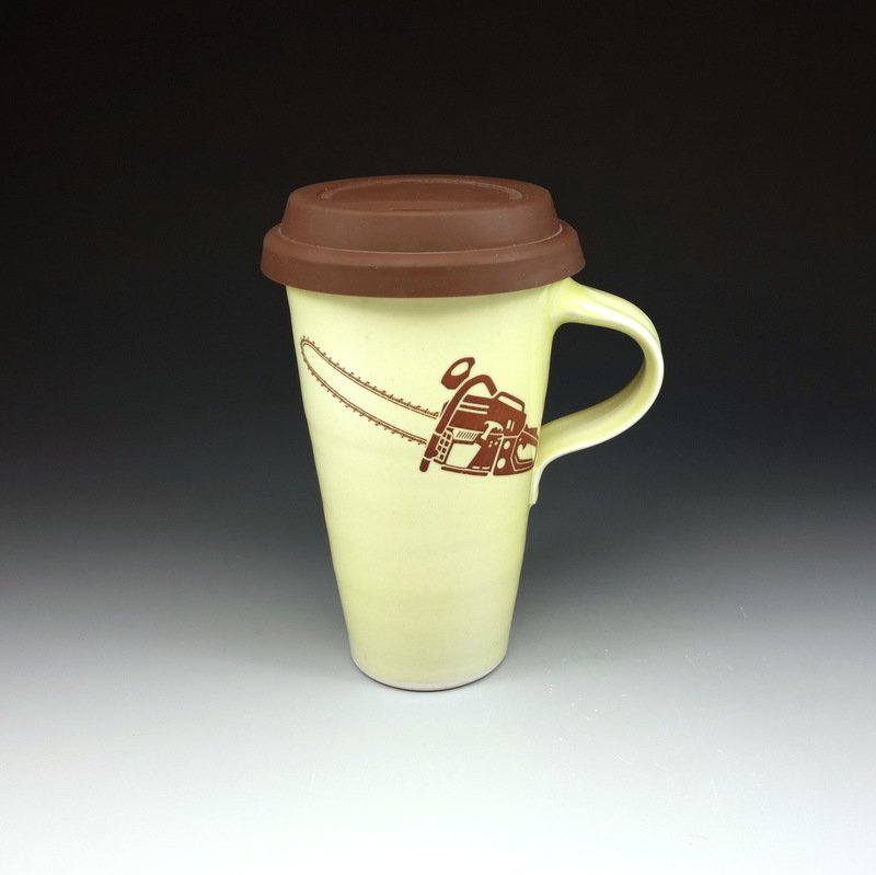 Travel mug with silicone lid by Emily Murphy Pottery The other side of this mug has the image of a lawnmower on it.  Mug can be used with or without lid.  Fits most car cupholders! 
