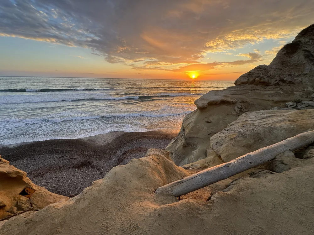 Sunset over coastal cliffs