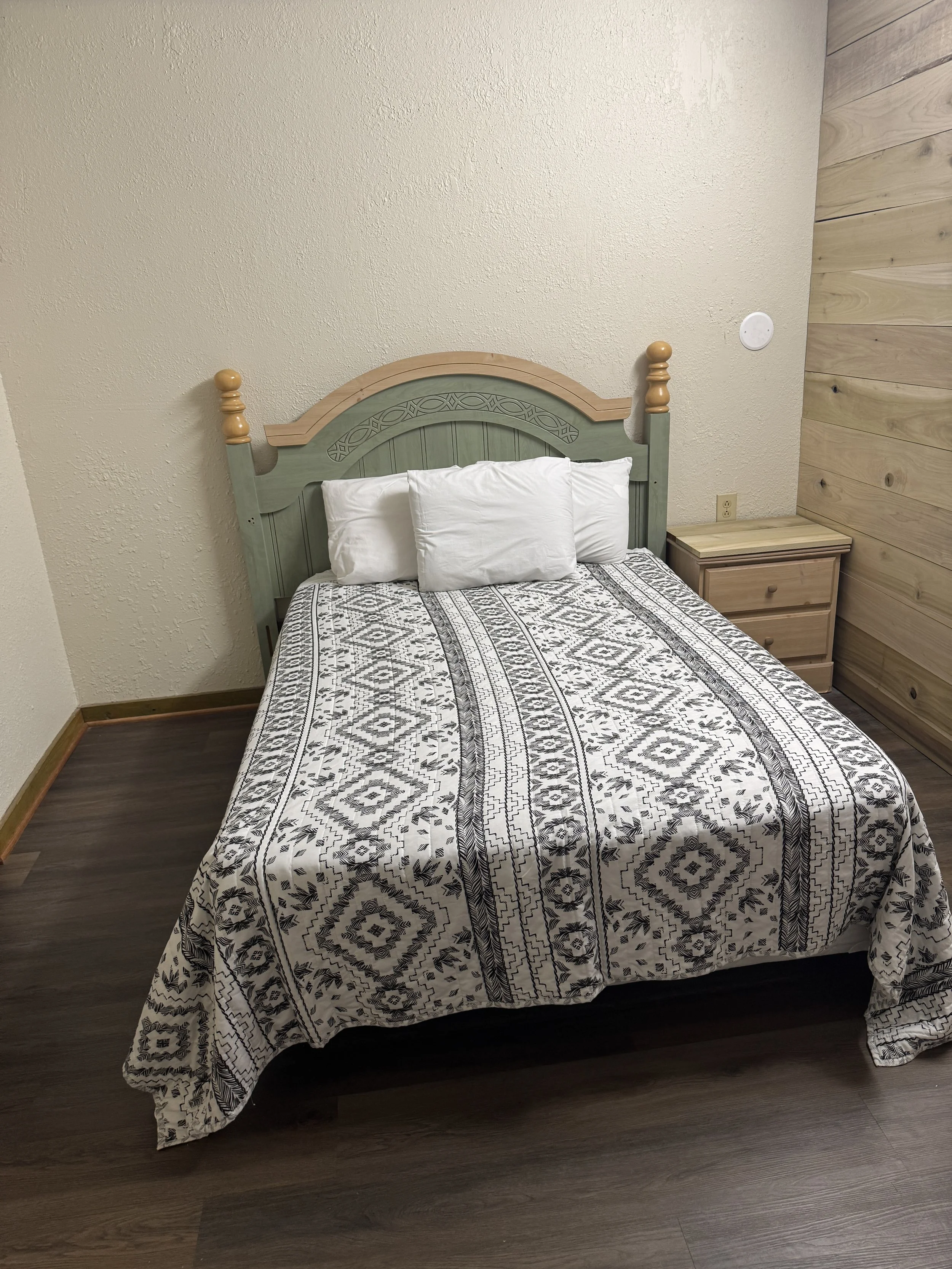 FishTale Lodge bedroom with bed and natural light