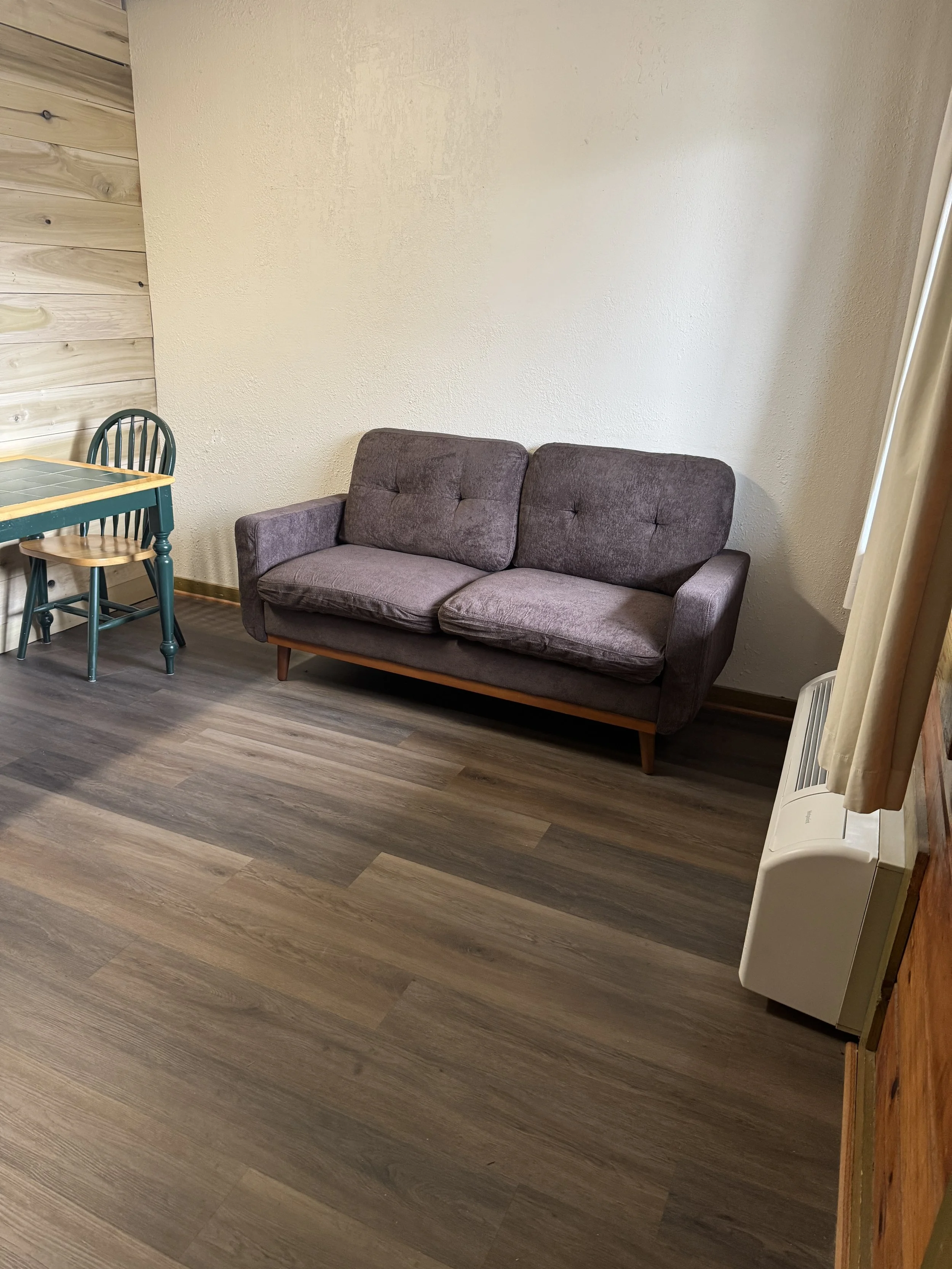 FishTale Lodge living area with couch and furniture