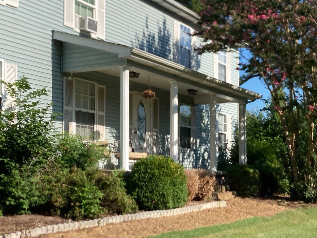 Two-story duplex rental property exterior in Henry County Tennessee