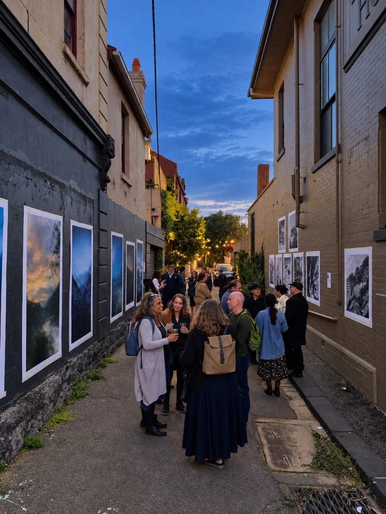 Exhibition opening in the laneway outside Down the Lane Studios