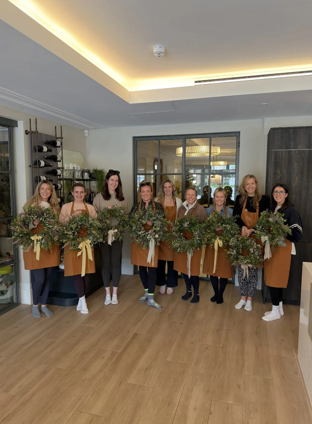 A wreath-making workshop group