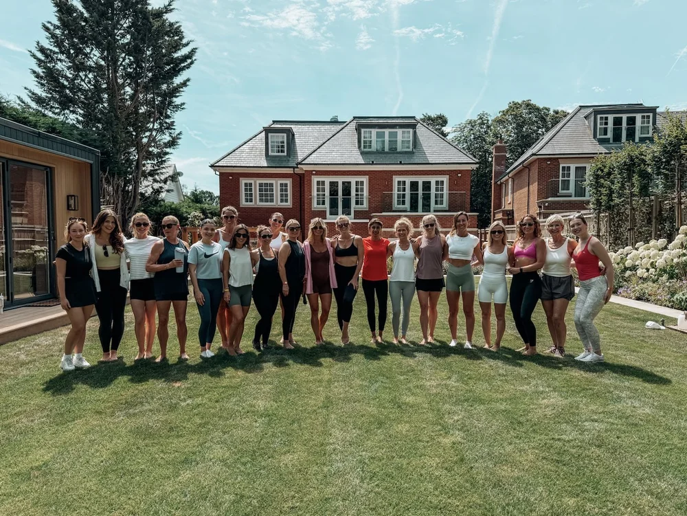 The studio community together on the lawn