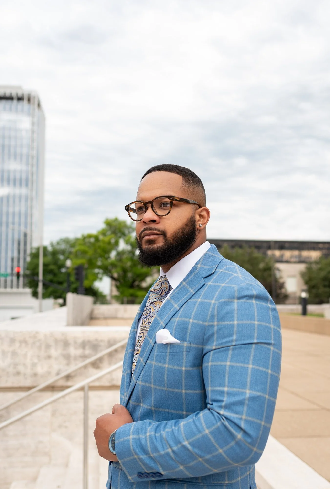 LaDarius Fitzgerald in a light blue windowpane blazer and gold paisley tie