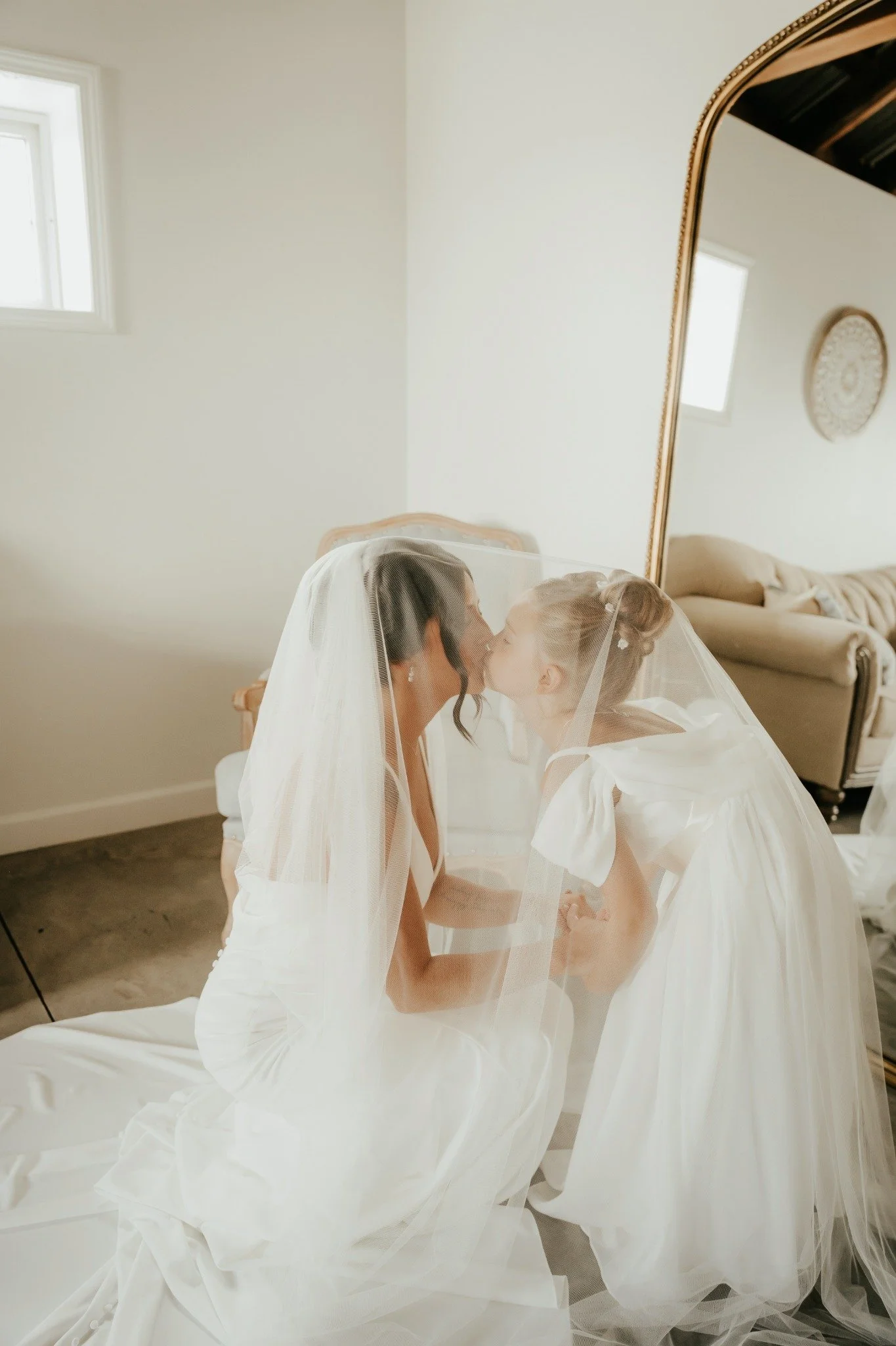 Bride preparing with loved ones in the Sable Creek Homestead bridal lounge
