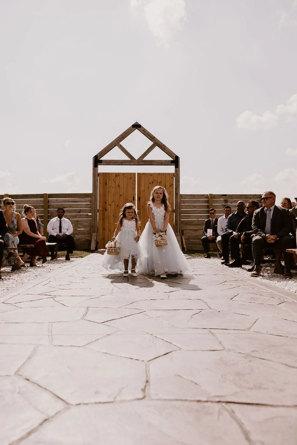 Grand bridal entrance and open-air wedding ceremony at Sable Creek Homestead