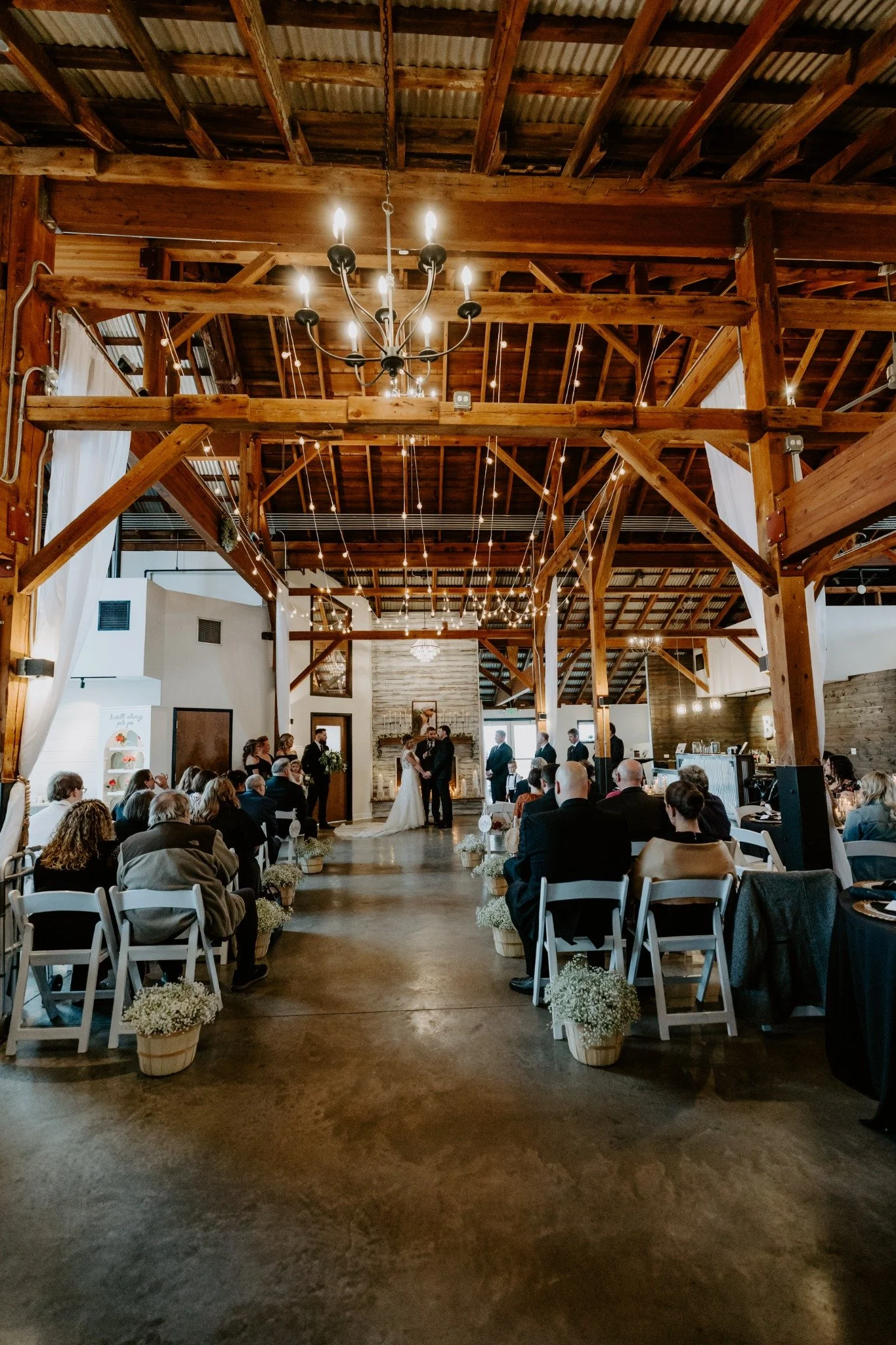 Wedding ceremony indoors at the restored Sable 1930 near Naperville