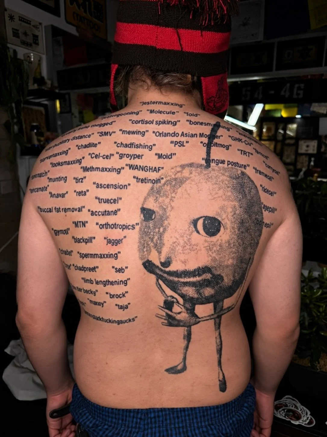 Apple meme tattoo-Tanner Clark-tattoo artist-converting culture magazine feature-2026