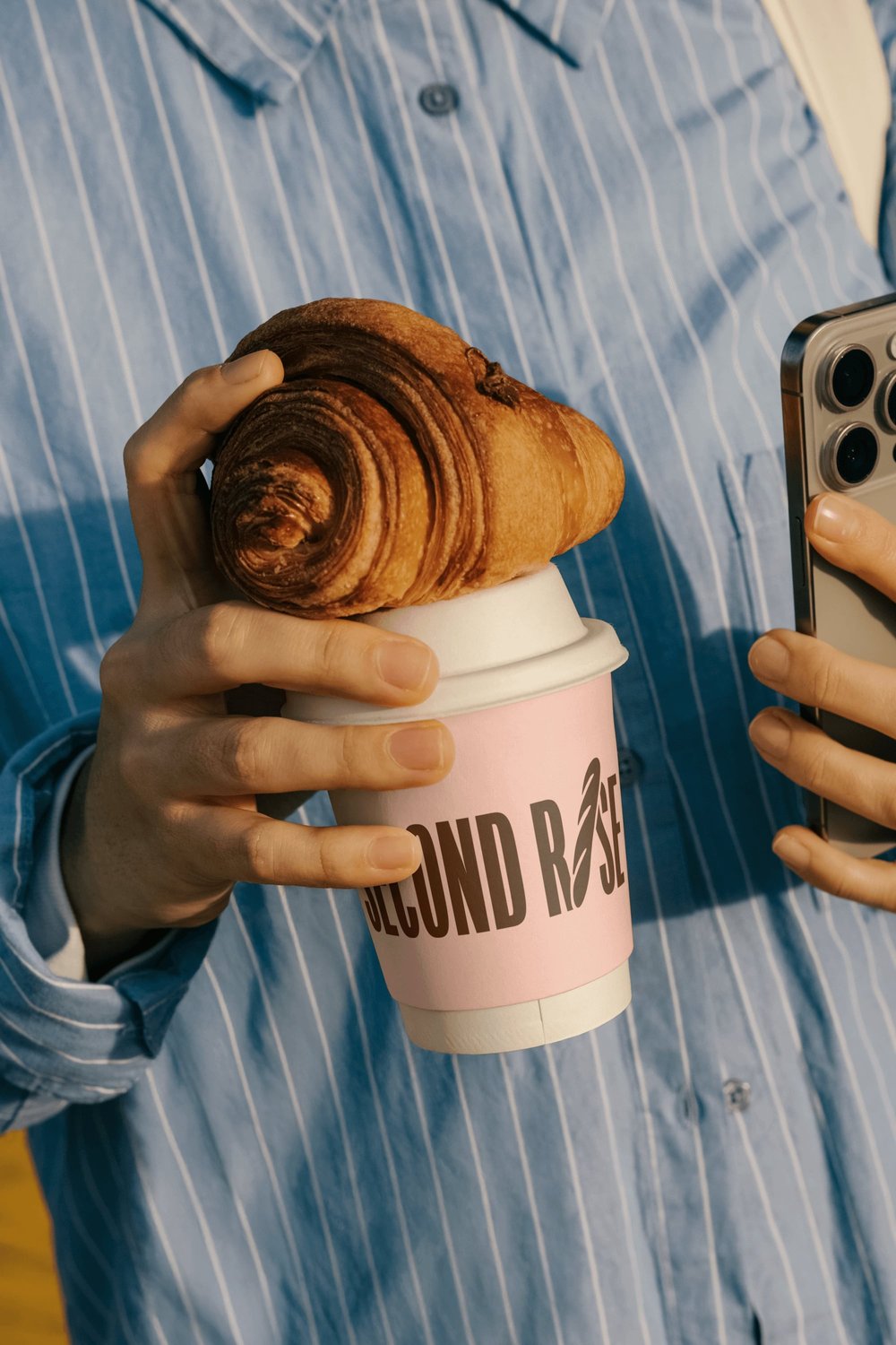 Bold logo design on cup by Brisbane brand specialist